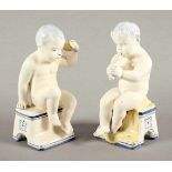 ZWEI FIGUREN BACCHANT UND PUTTO, Keramik, dezent polychrom glasiert, H bis 13,5, minimale