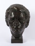 BILDHAUER, 20.Jh., "Portraitkopf von Jacques Brel", Bronze; H 36, bezeichnet auf der Plinthe "