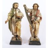 PAAR HEILIGENFIGUREN, Josef und Paulus, Holz, geschnitzt, besch., Reste polychromer Fassung, H 45,