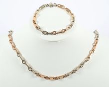 KETTE UND ARMBAND, 585/ooo Roségold und Weißgold, L 20 und L 73, Gesamtgewicht 71,0g, eine