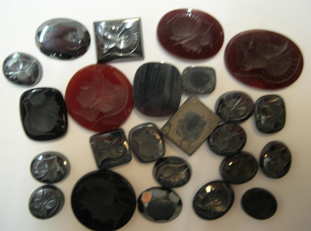 24 polished Haemite & Carnelian polished stones most with head intaglios