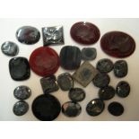 24 polished Haemite & Carnelian polished stones most with head intaglios