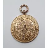 Large Edwardian 9ct gold, circular presentation medal to J Fishwick from ICI (18.8 grams)