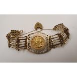 Elizabeth II 1965 sovereign (VF) in ornate 9ct gold gate bracelet (26 grams total weight)