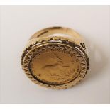 1/10th Krugerrand (VF) set in an ornate 9ct gold ring, Total overall weight is 5.7 grams, ring