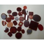 Collection (29 items) of polished Carnelian & Carnelian type stones