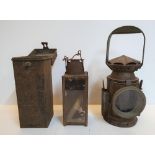 2 old metal railway lanterns, 1 a 1918 Howes & Burley compete with outer metal case, the other a