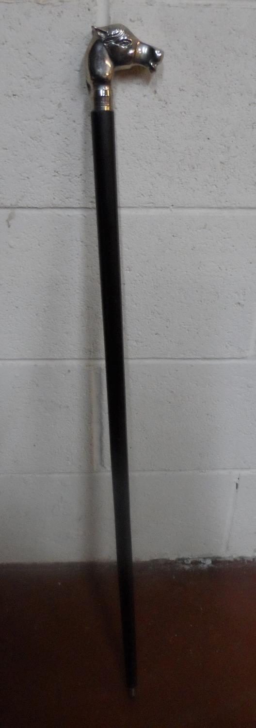 Unmarked, white metal horses head & ebonised wood walking stick with a white metal unmarked tip. The - Image 3 of 4