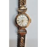 Ladies vintage Longines cocktail watch with 9ct gold case & original 9ct gold plated strap