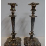 Pair of Edwardian plated candle-sticks in classical form (2), Both measure approx 31 cm