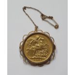 King Edward VII, 1906 gold Sovereign set in a 9ct gold brooch setting, Total combined weight is 10.5