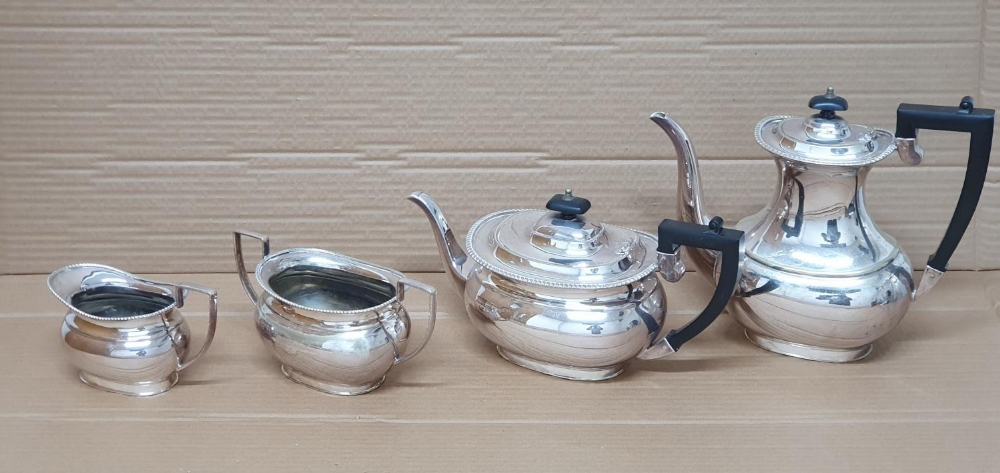 Fine quality Edwardian EPNS tea-set consisting of Tea-pot, hot-water pot , milk jug & sugar bowl (4)
