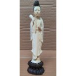 Finely carved, antique Japanese ivory figure of a geisha lady, The figure is 20cm tall Repair to the