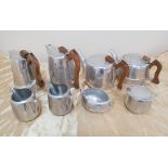 2 sets of vintage Picquot Ware tea sets, comprising of 2 tea pots, 2 hot-water pots, milk jug &