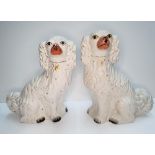 Pair of large Victorian Staffordshire flat-back dogs (2), Each measures 34 cm tall