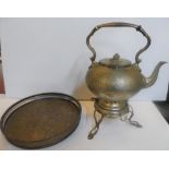Early 20thC eastern white metal, engraved tea-pot with stand together with a plated circular tray in