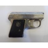 Vintage starter pistol, marked EM-GE in old cardboard box.