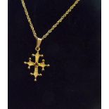 Goldroom collection, 9ct yellow gold cross & fine chain with central red stone complete with box &