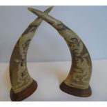 Pair of modern faux horn carvings (2), Each measures 36 cm