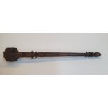 Carved African mace type object, 38 cm long