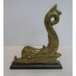 Victorian brass door stop in the form of a Dolphin, 26 x 31 cm