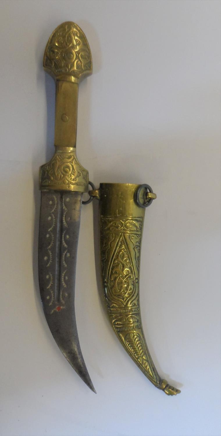 Early 20thC North African curved dagger with metal sheath, approx 23 cm in length