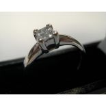 18ct white gold & diamond ring with 4 princess cut diamonds Approx 2.7 grams gross, size K
