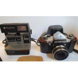 5 vintage cameras to include a Nikon Nuvis 160-I, a Polaroid Sun 600, a "Praktica" mat, a Minola XD7