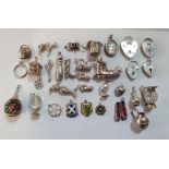 Collection of silver & unmarked white metal charms (30+)