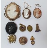 Collection of cameos, military badges & buttons , pendant, locket etc (lot)