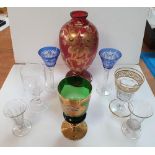 Collection of antique glass to include a craberry glass vase with painted flower decoration, a