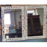 Pair of modern white painted wood fret mirrors, Each mirror measures 90 x 60 cm overall size