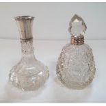 Two cut-glass ladies perfume bottles, one witha silver collar the other in unmarked metal collar (2)