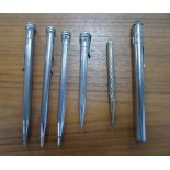 Collection of silver-plate vintage propelling pencils & brush (6)