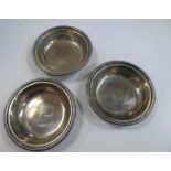 Three heavy, indistinctly stamped plain bowls with later soldered rims by G R Collis & Co, Regent