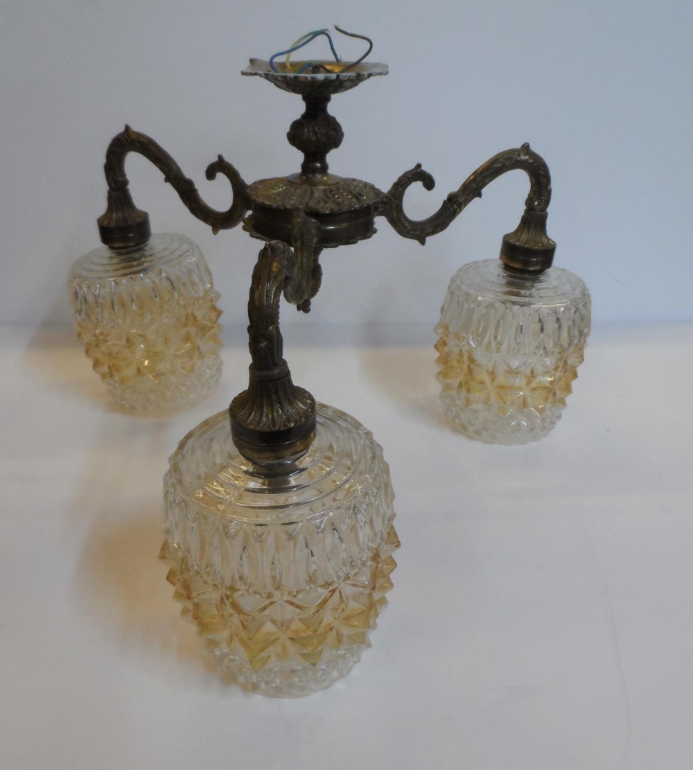 Early 20thC ceiling lights with 3 original glass light fittings on brass fixture