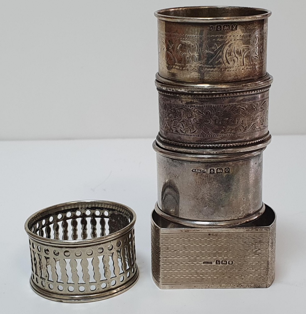 Five silver napkin holders (1 with rubbed marks) all differing patterns, marks etc (5) - Image 2 of 2