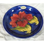Moorcroft floral shallow dish, circa 1940, 18 cm in diameter, Appears in fine condition for its