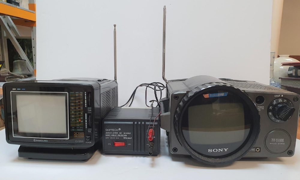 A vintage Sony TVS II VK TV transmitter with a Samsung CL-125R Portable TV together with a