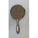 Silver covered hand held mirror, 310 grams gross