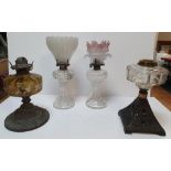 Four small Victorian oil lamps, 2 glass examples, and 2 cast metal base examples (1 a/f) - (4)