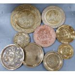 Collection of nine circular brass & copper wall hanging plaques (9)
