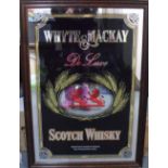 Whyte & MacKay, Scotch whiskey advertising mirror in oak frame, The mirror measures 80 x 52 cm