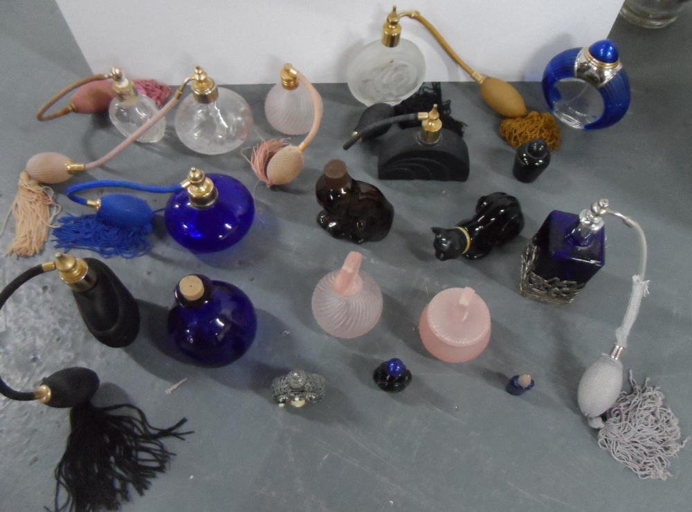 Collection of eighteen ornate perfume bottles (18)
