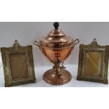 Copper samovar together with 2 mid 20thC ornate pair of brass photo frames (3)