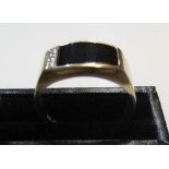 9ct yellow signet ring with onyx & diamonds Approx 3.3 grams gross, size V