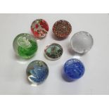 Collection of seven glass paper-weights (7)