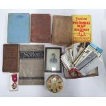 Collection of small antiques to include an old book on Norton motorbikes, postcards, many relating