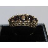 9ct yellow gold 5 garnet ring Approx 4.2 grams gross, size O