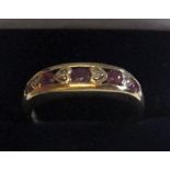 9ct yellow gold ring with round cut rubies interspersed with diamonds approx 2.3 grams gross, size N